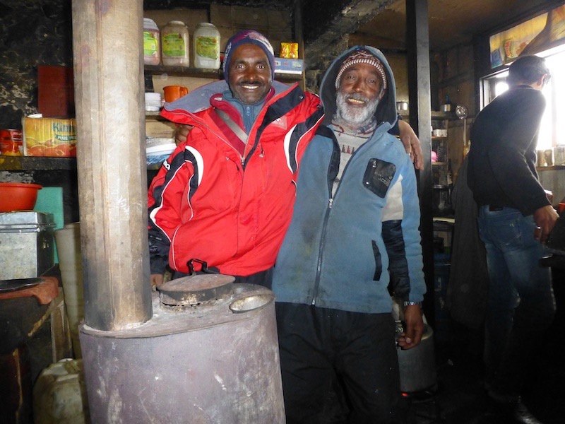 Our guide Majeed and our lucy-time host at Seven Spring. Inside his kitchen on a snowy day.